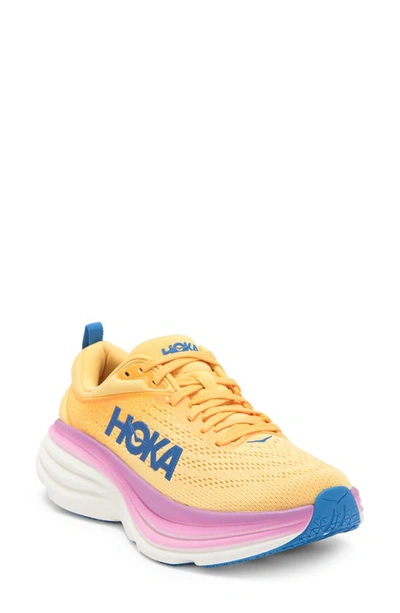 Shop Hoka Bondi 8 Running Shoe In Impala/ Cyclamen