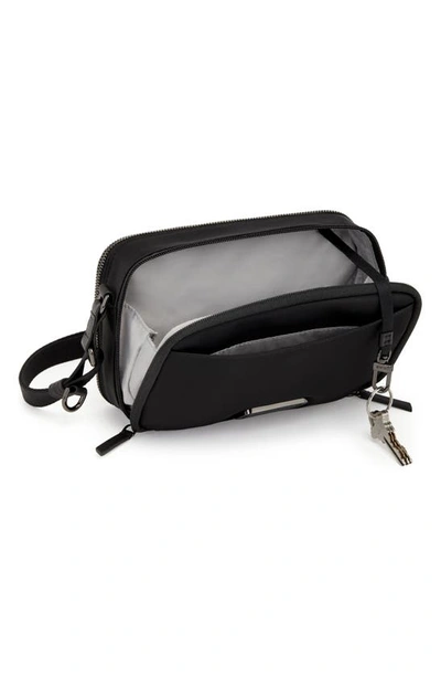 Shop Tumi Langley Crossbody Bag In Black/ Gunmetal