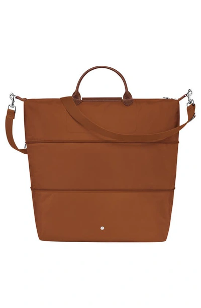 Shop Longchamp The Pliage Expandable Duffle Bag In Cognac