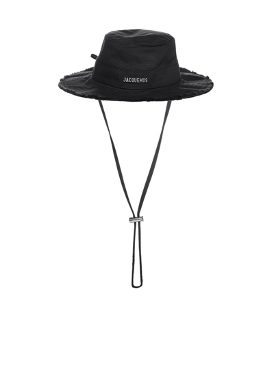Shop Jacquemus Distressed Logo Plaque Bucket Hat In Black