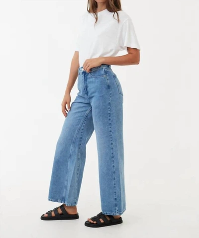 Shop Afends Gigi Flared Jeans In Worn Blue
