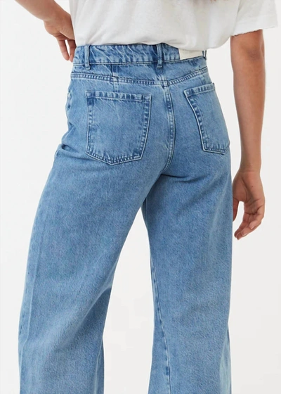 Shop Afends Gigi Flared Jeans In Worn Blue