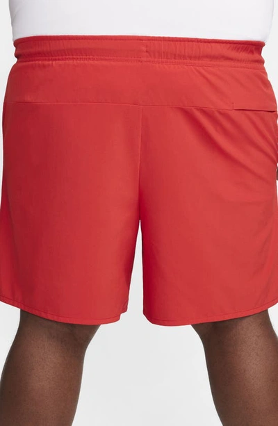 Shop Nike Dri-fit Unlimited 7-inch Unlined Athletic Shorts In University Red/ Black