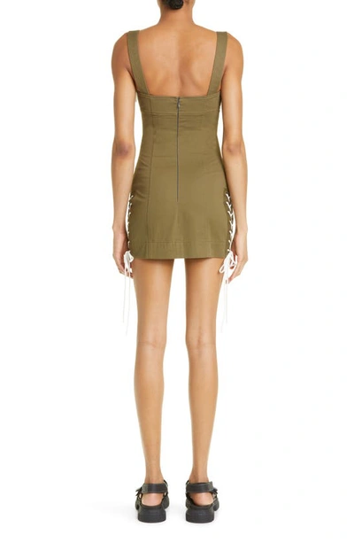 Shop Monse Cutout Lace-up Cotton Twill Bustier Minidress In Olive