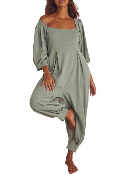 Shop Free People Lotta Love Balloon Sleeve Cotton Jersey Jumpsuit In Washed Army