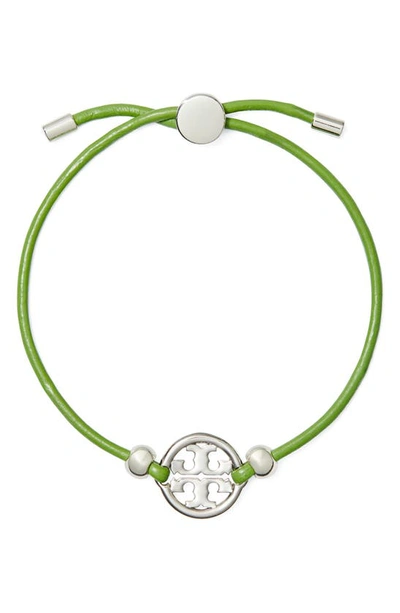 Shop Tory Burch Miller Logo Slider Bracelet In Tory Silver / Wheatgrass