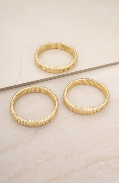 Shop Ettika Set Of 3 Stretch Cuffs In Gold