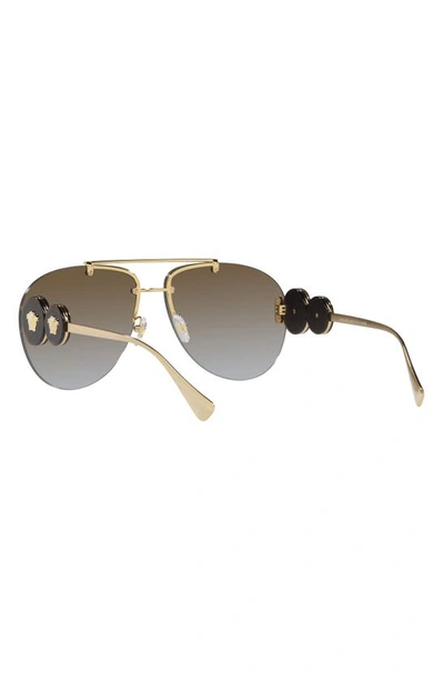 Shop Versace 63mm Oversize Gradient Aviator Sunglasses In Gold