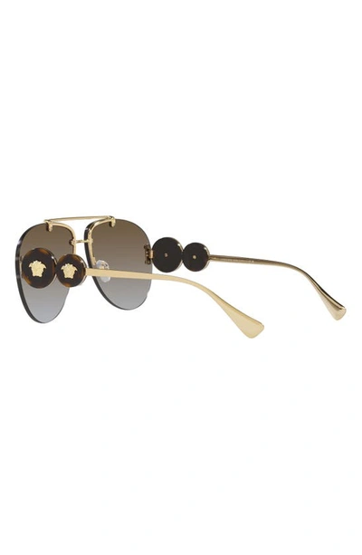 Shop Versace 63mm Oversize Gradient Aviator Sunglasses In Gold