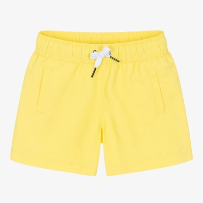 Shop Givenchy Boys Yellow Paint Logo Swim Shorts