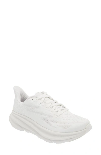 Shop Hoka Clifton 9 Running Shoe In White / White