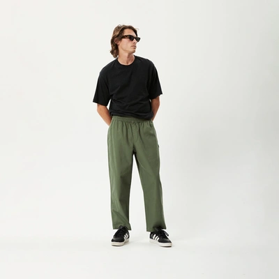 Shop Afends Recycled Baggy Elastic Waist Pants In Green