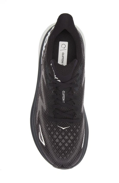 Shop Hoka Clifton 9 Running Shoe In Black / White