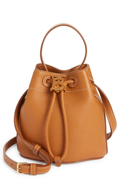 Shop Burberry Large Monogram Leather Drawstring Bucket Bag In Warm Russet Brown