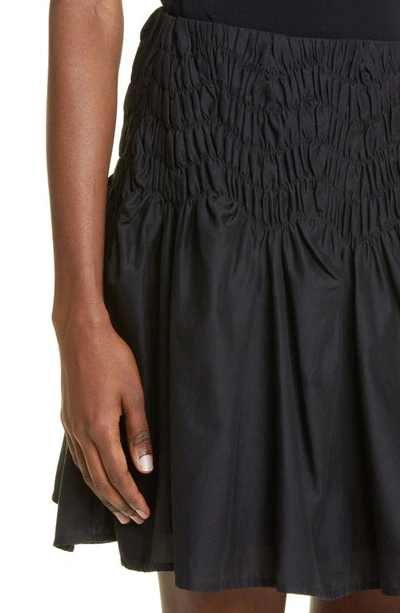 Shop Merlette Elysian Wave Smocked Skirt In Black