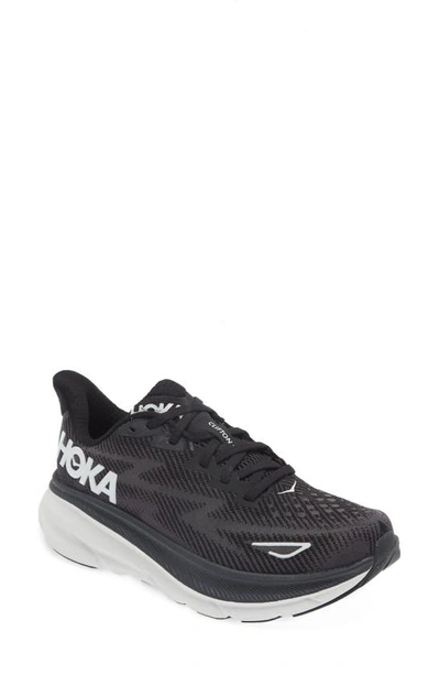 Shop Hoka Clifton 9 Running Shoe In Black / White