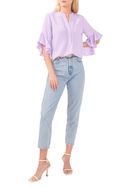Shop Vince Camuto Ruffle Sleeve Split Neck Blouse In Cool Lavender