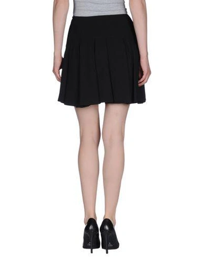 Shop Saint Laurent Mini Skirt In Black
