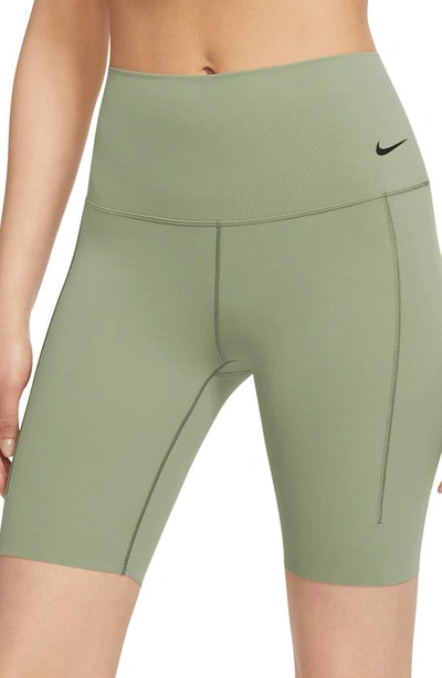 Shop Nike Zenvy Gentle Support High Waist Bike Shorts In Oil Green/ Black