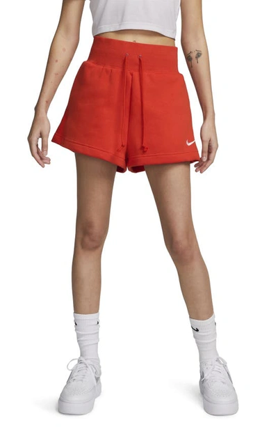 Shop Nike Phoenix Fleece Knit Shorts In Picante Red/ Sail