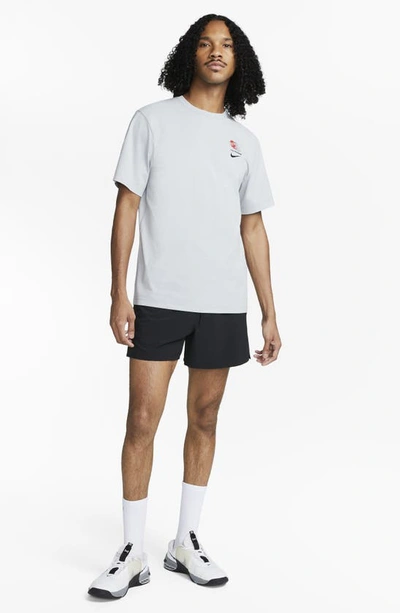 Shop Nike Dri-fit Unlimited 5-inch Athletic Shorts In Black/ Black/ Black