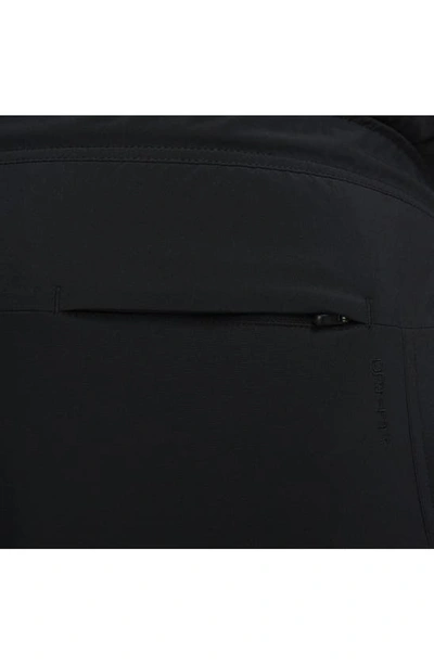 Shop Nike Dri-fit Unlimited 5-inch Athletic Shorts In Black/ Black/ Black