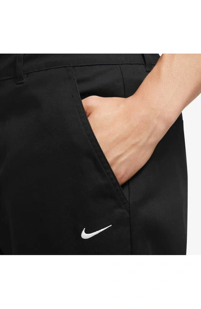 Shop Nike Life Stretch Cotton Chino Pants In Black/ White