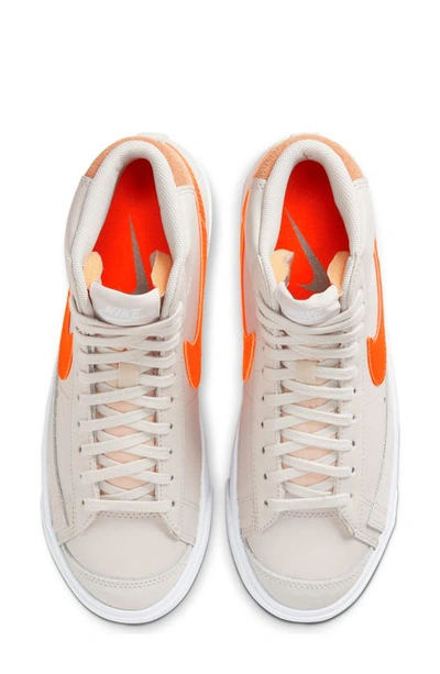 Shop Nike Blazer Mid '77 High Top Sneaker In Light Bone/ Orange/ Orange