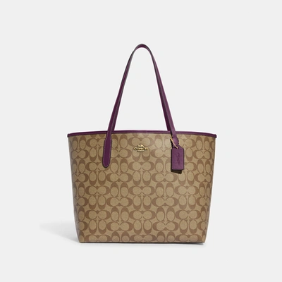 Shop Coach Outlet City Tote In Signature Canvas In Brown