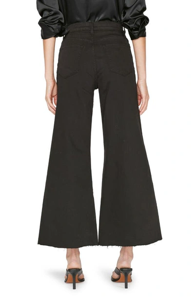 Shop Frame Le Palazzo Raw Hem Wide Leg Jeans In Film Noir