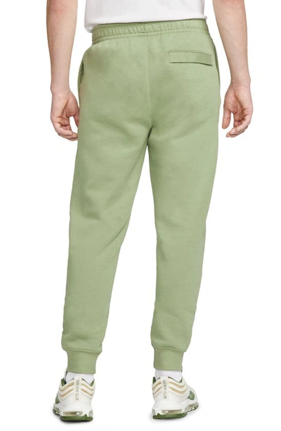 Shop Nike Sportswear Club Pocket Fleece Joggers In Oil Green/ Oil Green/ White