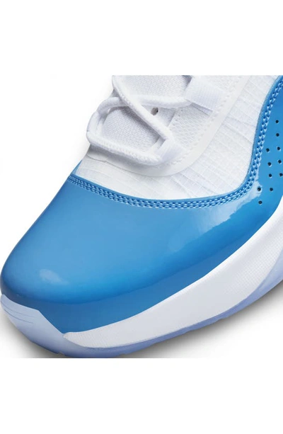 Shop Jordan Air  11 Cmft Low Sneaker In White/ University Blue