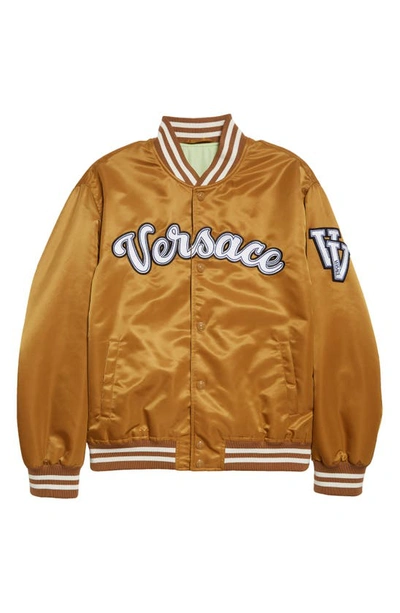 Shop Versace Varsity Script Satin Baseball Jacket In Toffee