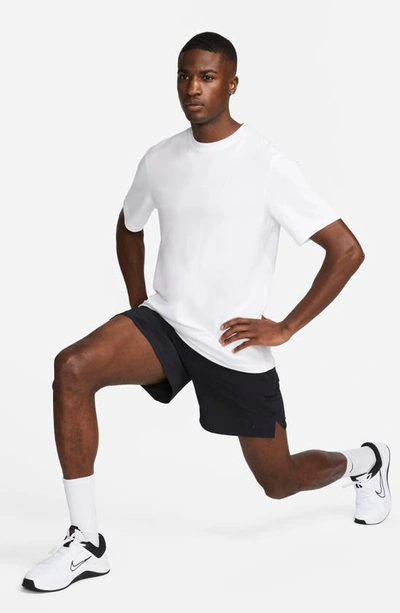 Shop Nike Primary Training Dri-fit Short Sleeve T-shirt In White/ White