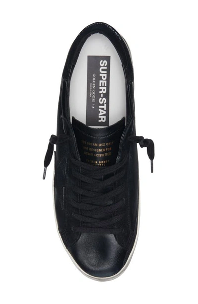 Shop Golden Goose Super-star Low Top Sneaker In Black