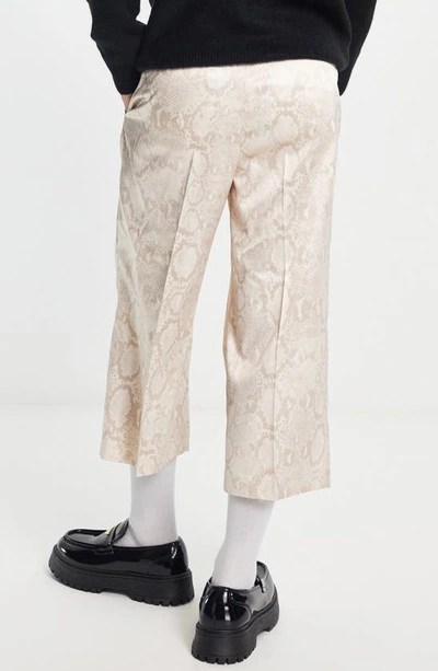 Shop Asos Design Snake Print Crop Wide Leg Trousers In Stone