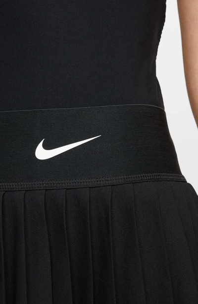 Shop Nike Court Dri-fit Advantage Pleated Tennis Skirt In Black/ White