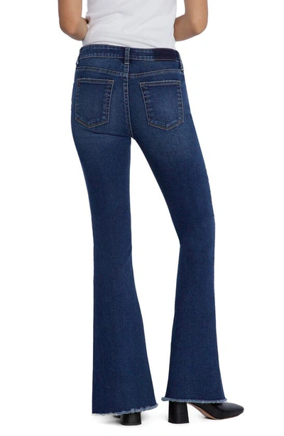 Shop Hint Of Blu Fun Frayed Slim Flare Jeans In Riptide