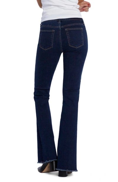 Shop Hint Of Blu Fun Frayed Slim Flare Jeans In Current