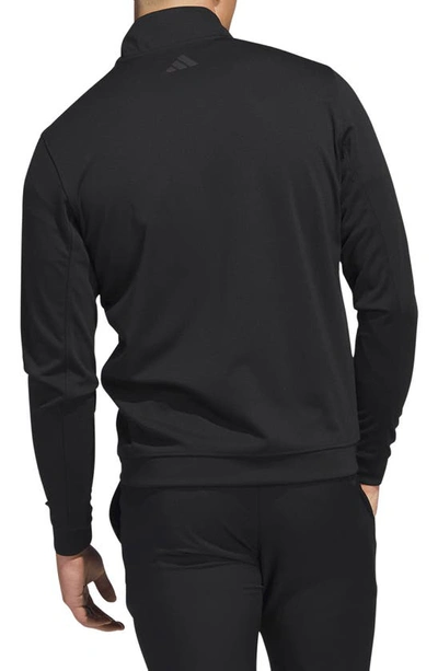 Shop Adidas Golf Elevated Stretch Half Zip Pullover In Black