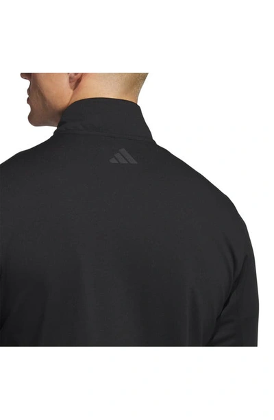 Shop Adidas Golf Elevated Stretch Half Zip Pullover In Black