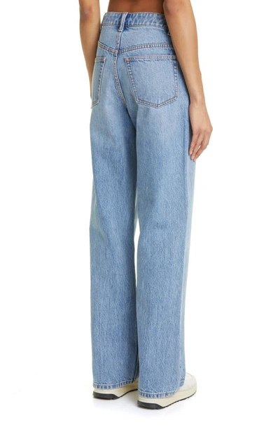 Shop Alexander Wang Asymmetric Waist Slouchy Nonstretch Jeans In Vintage Light Indigo
