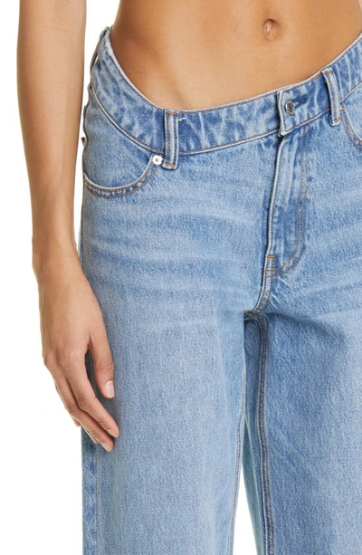 Shop Alexander Wang Asymmetric Waist Slouchy Nonstretch Jeans In Vintage Light Indigo