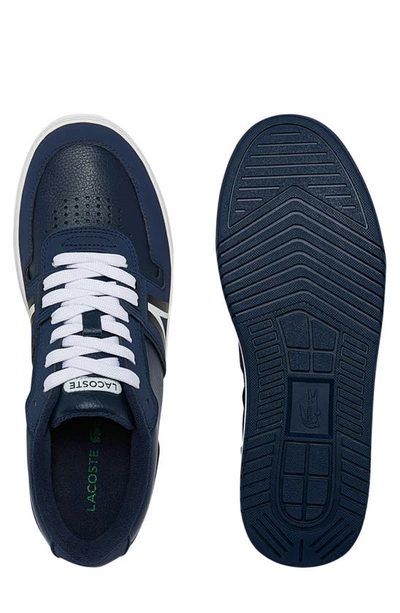 Shop Lacoste L001 Sneaker In Navy/ White