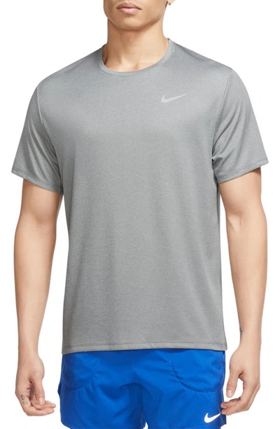 Shop Nike Dri-fit Uv Miler Short Sleeve Running Top In Particle Grey/ Reflective Silv