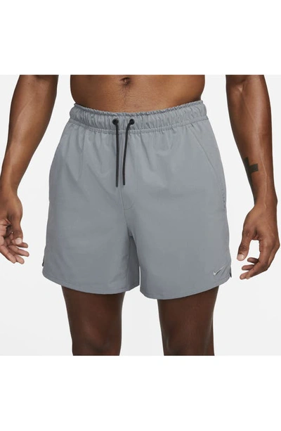 Shop Nike Dri-fit Unlimited 5-inch Athletic Shorts In Smoke Grey/ Black/ Smoke Grey