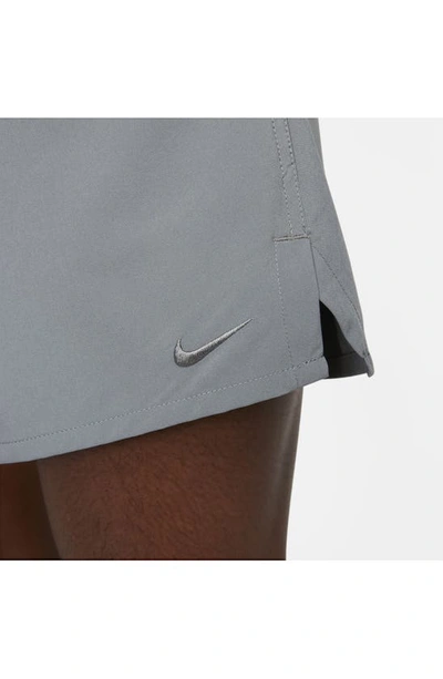 Shop Nike Dri-fit Unlimited 5-inch Athletic Shorts In Smoke Grey/ Black/ Smoke Grey