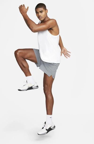 Shop Nike Dri-fit Unlimited 5-inch Athletic Shorts In Smoke Grey/ Black/ Smoke Grey