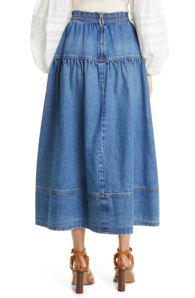 Ulla Johnson The Astrid Flared Denim Midi Skirt In Danube Medium Indigo ...