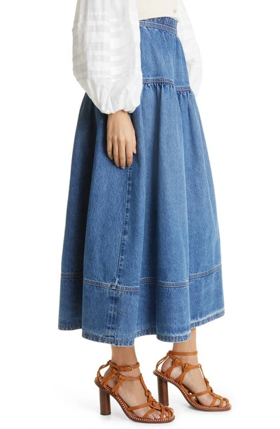 Shop Ulla Johnson The Astrid Denim Maxi Skirt In Danube Medium Indigo Wash